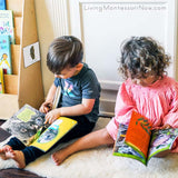 2-Year-Old Cousins Looking at Koala Books Near the “I Can Rest” Mindfulness Card _ Living Montessori Now