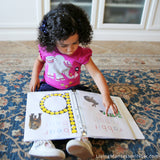 Reading Her Animal Alphabet Book _ Living Montessori Now